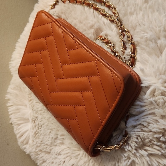 Bebe quilted bag with Gold rope chain cross body bag. Gently Used - Picture 6 of 16